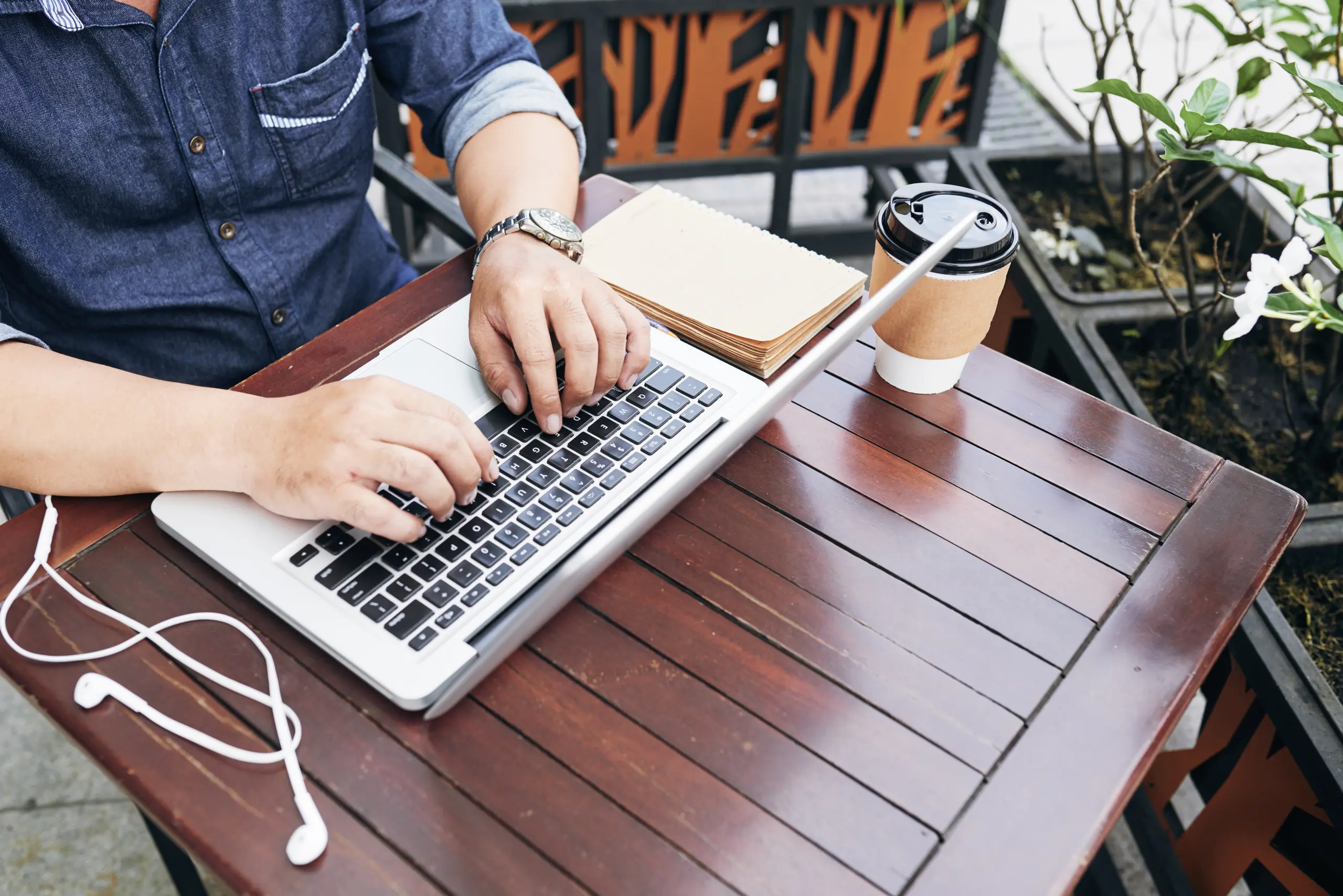 Man coding at a desk